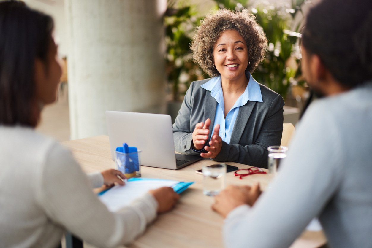 Professionals sitting around a conference table